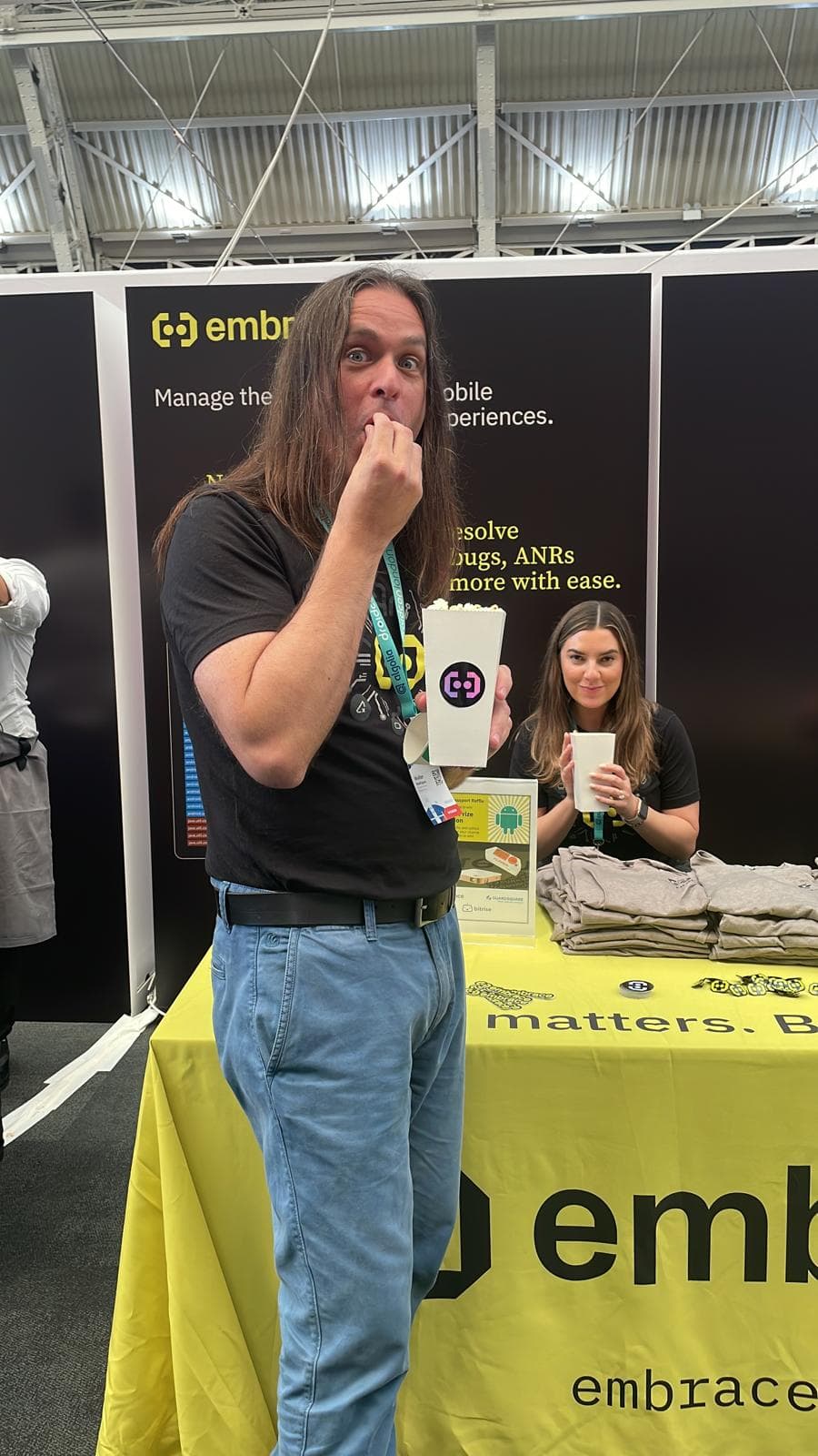 Walter-eating-popcorn-at-the-Embrace-booth